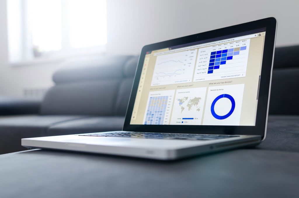 Photo of laptop showing business dashboard as part of outsourcing accounts