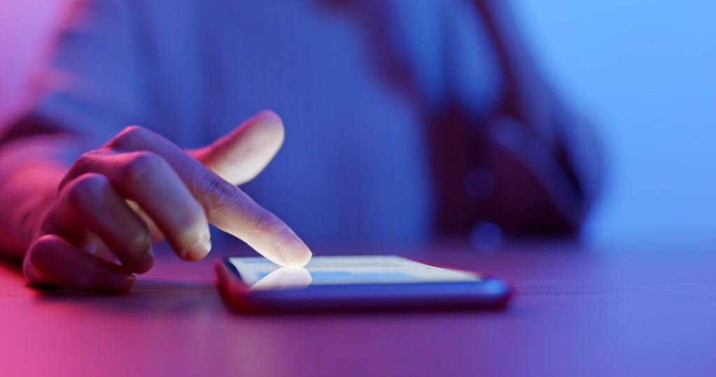 Smarter Working series: People First, Adaptive Leadership, Customer Engagement (photo of business person using smartphone)
